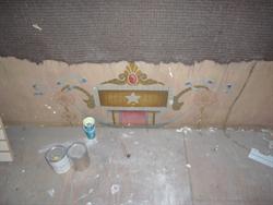 Cloth partially protects a section of original wall. The star design provided a thematic motif for the Star Theatre. - , Utah